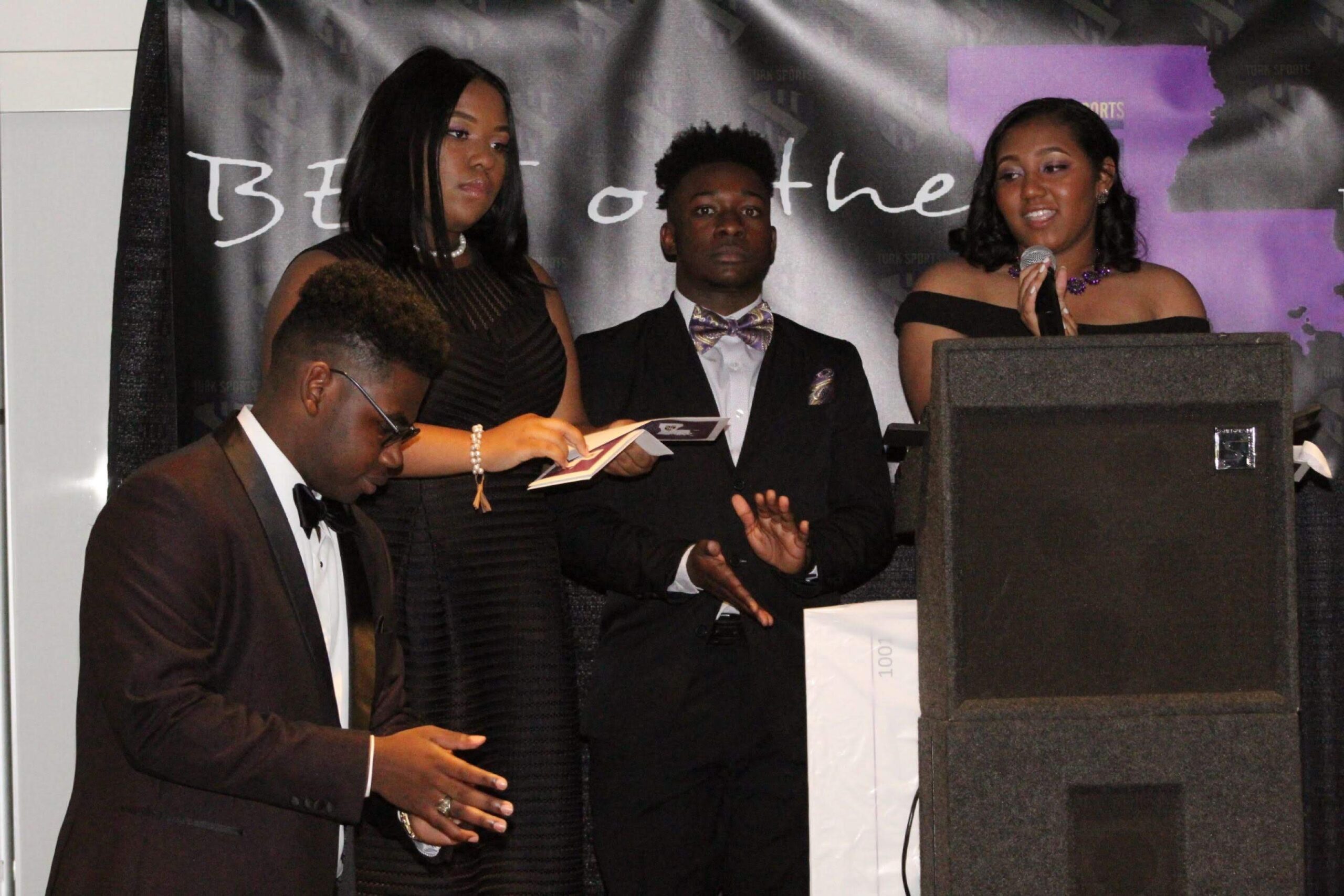 Members of Turk's Team Share a Thought with attendees- (left to right) Earl "Turk" Mackie, Jazmyn Mackie, Lance Jones & Amari Hurst